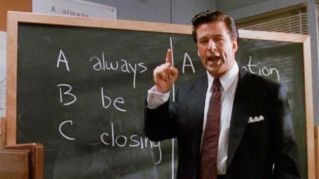 Alec Baldwin in Glengarry Glen Ross pointing at a chalkboard reading "Always Be Closing" — the classic ABC motivational sales-meeting still.